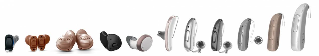 What local hearing aid center has a row of customized and standard hearing aids, from the smallest in the ear style to the largest behind the ear?