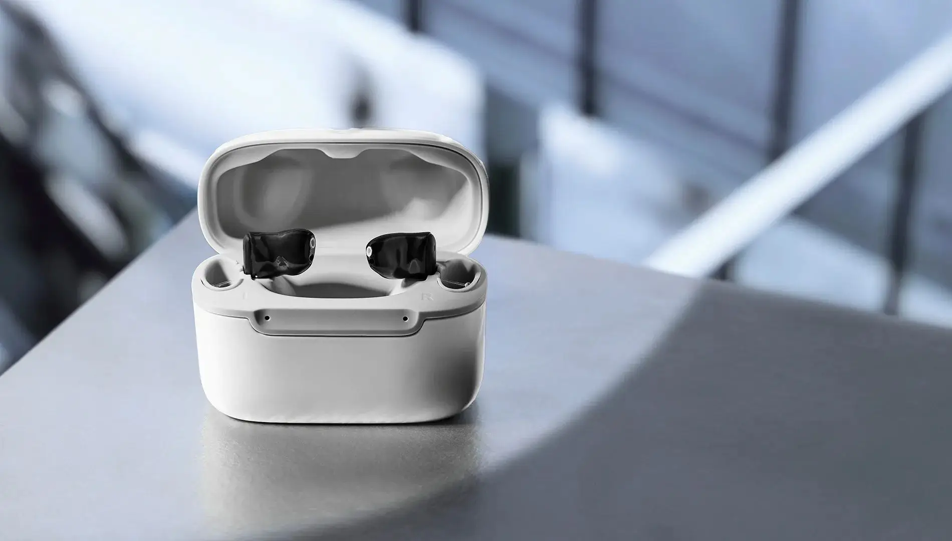 Signia Insio Charge&Go IX CIC rechargeable custom CIC hearing aid with portable charging case